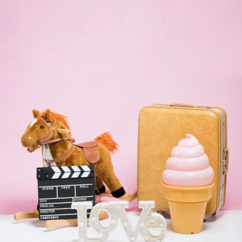 various-objects-against-pink-wall